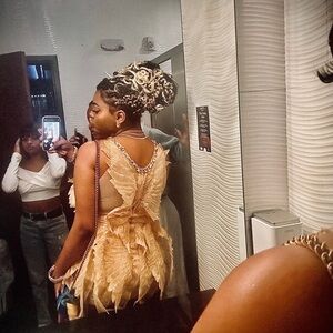 Elegant Gold Feathered Dress